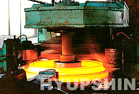 Forged steel flange production